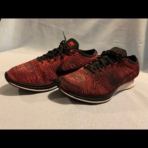Pre Owned NIKE Flyknit Racer “Fire Rooster” Sz 11